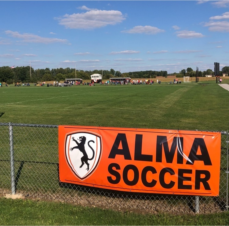Alma soccer with field in background